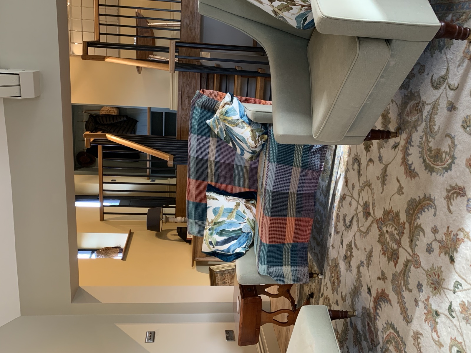 Open-plan barn conversion with mezzanine gallery and double-height ceiling