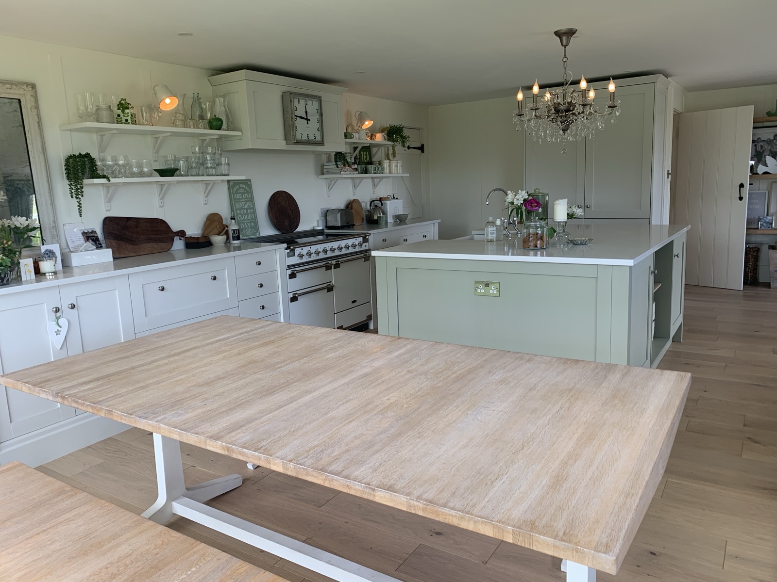 Wide kitchen and dining space designed with open, flexible layout