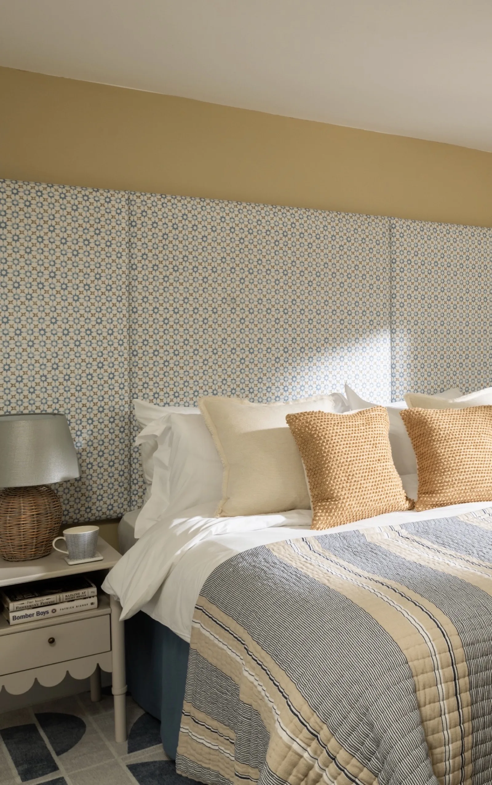 Bedroom retreat with linen palette and sea views