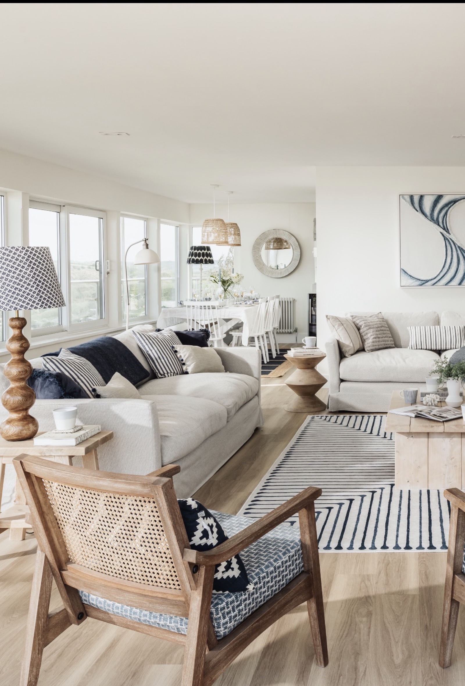 Holiday let interior design — coastal living room styled for maximum guest appeal